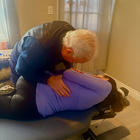 Chiropractor Barstow CA Scott Martin Adjusting Patient